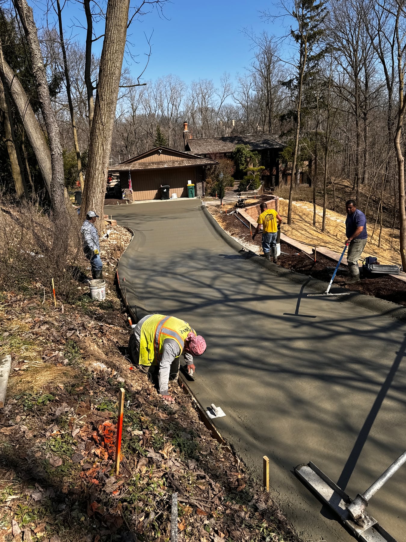 Concrete patio being poured by Upmost